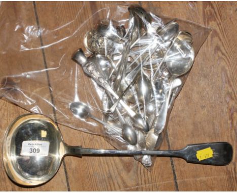 A collection of silver plate to include a large ladle, spoons, fish knives and forks, etc 