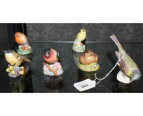 A collection of four Royal Worcester figurines of birds and two others by Aynsley and Goebel (6)