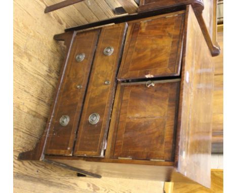 A small chest with two doors and two drawers below, converted from a commode, 73H x 68W x 49cmD