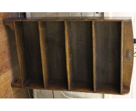 A stained oak five-shelf book case, 105H x 60W x 16cmD