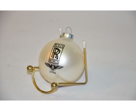 This item is a holiday ornament with the RR logo and the Flying B logo and is dated 1996. This omament would make a great gif