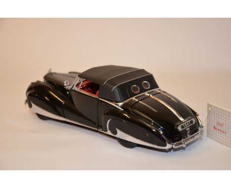 Franklin Mint.THIS IS A DIE CASE REPLICA OF ONE OF THE WORLDS MOST BEAUTIFUL AUTOMOBILES. THE HOOD ORNAMENT IS MISSING. THERE