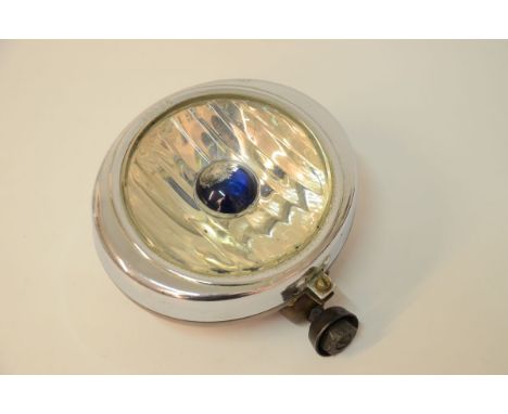 This is a small version compared with some, 8" across. Full bra- rare. Good rim, reflector, and glass, most of the blue paint