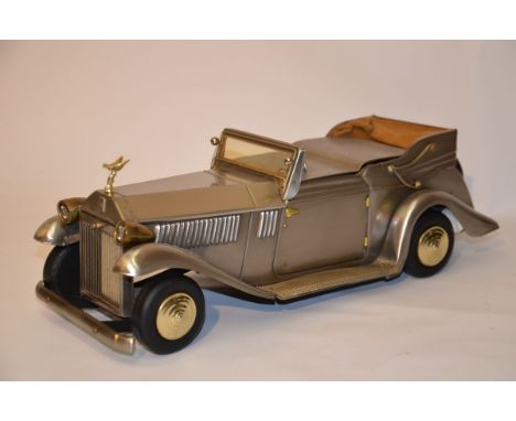 a highly collectible Rolls Royce item - a metal car music box that holds jewelry or anything else you might like to put insid