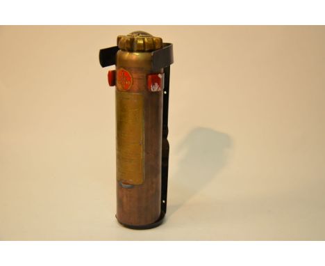 Silver Wraith and Bentley series (1940s and 1950s) often included this unique metal fire extinguisher and mounting bracket. "