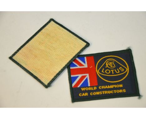 This item is a set of two (2) green Lotus patches with the Lotus logo in gold and a segment of the British ï¬‚ag. "World Cham