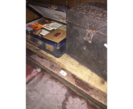 A metal trunk with tools and a small case of screws, etc. 