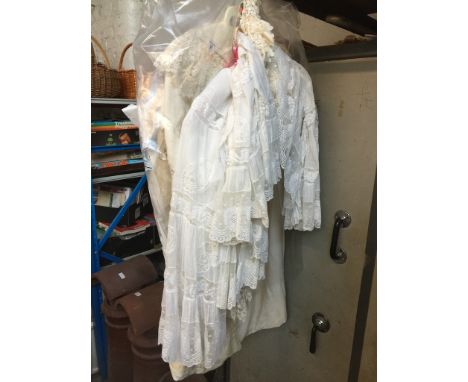 2 vintage cream children's christening ware and a white vintage christening gown with cape.Condition:- General wear through a