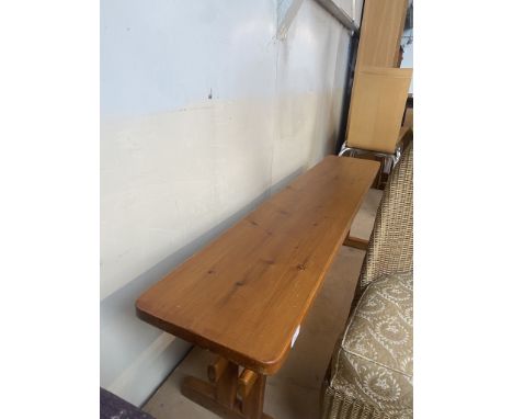 A pine bench. 