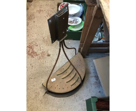 A brass console tray table holder. 