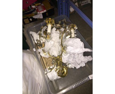 A gilt brass and glass chandelier ceiling light fitting. 