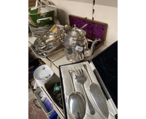 A collection of silver plated items including tea pot, cutlery, salmon servers dishes, etc 