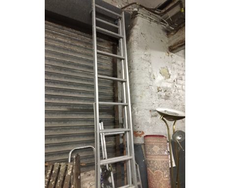 An aluminum extension ladder 