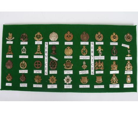 Military Cap Badges: Mixed age badges with fixings to back mounted on card to include Military Police, R.E, Army Ordnance Cor