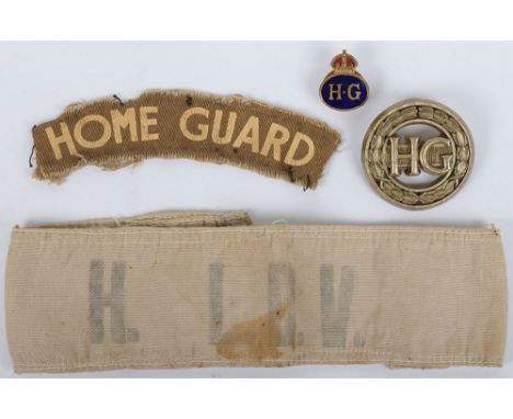 WW2 Home Guard/ LDV Badges: Early faded H.LDV armband , WW2 HOME GUARD printed shoulder title, HG enamel badge and Plastic ba