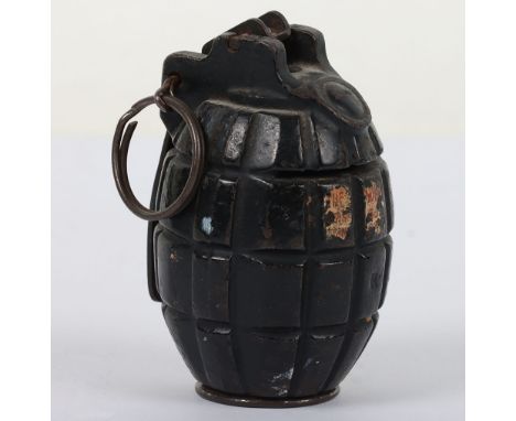 Mills Grenade Money Box: Inert trench art painted Mills bomb grenade turned into a money box with coin split to front and rem