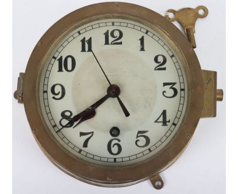 German Ships Clock: Brass housed bulkhead clock made by MECHANIK feintechnik VEB glashutte Sa  on clock face, clean 12.5 cms 
