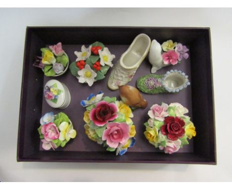 A mixed lot of ceramics including Coalport and Crown Staffordshire floral baskets, Old Foley shoe and Royal Worcester robin