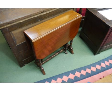 A George V mahogany small Pembroke style occasional table with ring-turned uprights and stretcher