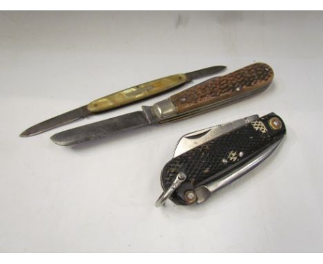 Three penknives including a George Wostenholm example, army and another with whale to blade