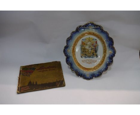 A Boer war 'Peace Proclaimed Sunday June 1st 1902, ceramic wall hanging and a WWI London in Gala Dress photograph album (2)