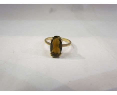 A smoky quartz set ring, unmarked