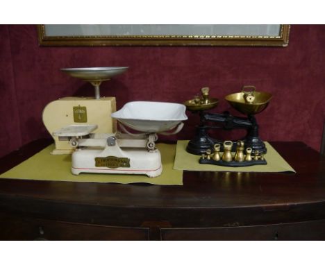 Three sets of scales including a set of Salter brass weights on stand and other brass weights 