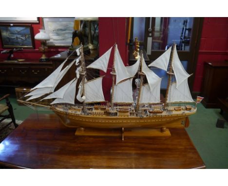 A hand built model of J.S. Elcano, a four masted barquentine ship, on display base (a/f)