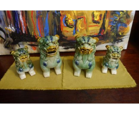Four Polychrome ceramic dogs of Fo. Tallest - 20cm