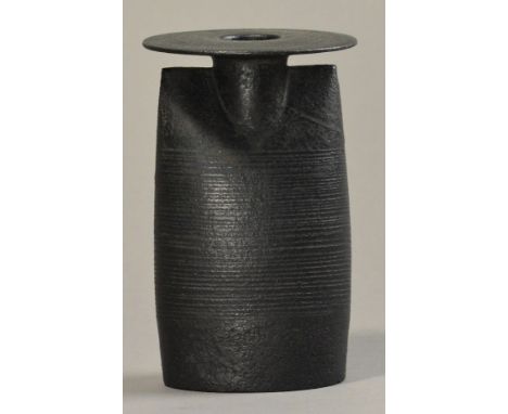 HANS COPER (1920-1981); a stoneware flattened bottle with flat circular lip, turned lines under burnished black slip, impress