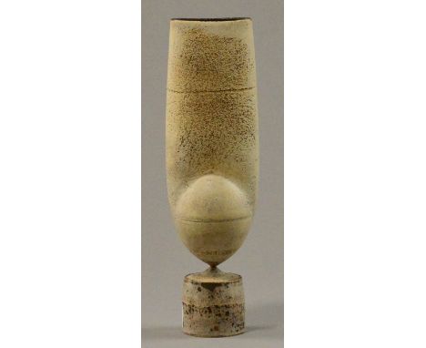 HANS COPER (1920-1981); a stoneware bulbous cycladic form pinned to blistered drum base, white slip over textured manganese g