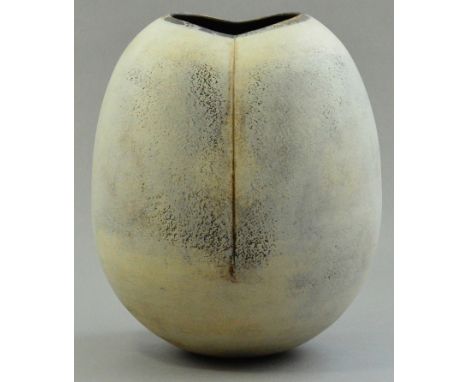 HANS COPER (1920-1981); a large stoneware lobed ovoid form, vertical impressions front and back, white slip over textured man
