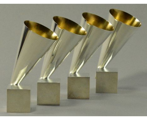 CHRIS KNIGHT (born 1964); four hallmarked silver drinking vessels in the form of cones on cubes, Sheffield 1993, height 17cm,