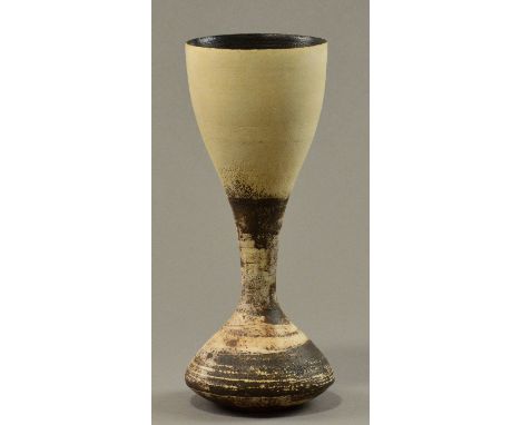 HANS COPER (1920-1981); a stoneware hourglass vase, white slip over textured manganese ground, pronounced to lower half, burn