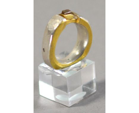 TANJA UFER (born 1973); a rough cut ring, silver and 22ct gold, kumboo rough diamond, ring size O.

Provenance: Purchased in 