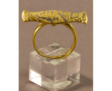 JACQUELINE MINA (born 1942); an 18ct gold and platinum ring, length 3cm, ring size Q, approx. 6.3g.

Provenance: Purchased fr