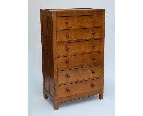 ROBERT 'MOUSEMAN' THOMPSON; an oak tall chest of drawers, the frieze decorated with 'halfpenny' detail above six drawers with