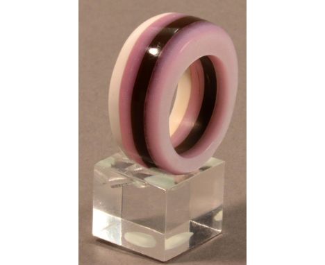 SARAH THIRLWELL; a chunky acrylic ring, purple, lilac and white, ring size R.

Provenance: Purchased from The Craft Centre an