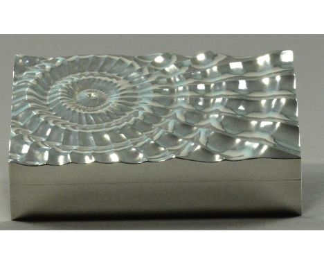 ALEX BROGDEN (born 1954); a hallmarked silver 'Quake' rectangular box, fluted with wavy lines in the form of a fossil, Sheffi