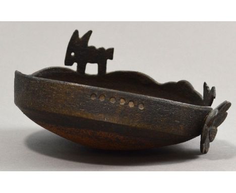 IAN GODFREY (1942-1992); a lopsided stoneware bowl, bronze glaze, donkey and duck to pierced rim, flower to one side, incised