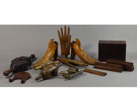 A quantity of tools and treen including 'THE HOWKINS PLANE MODEL A', three rounding planes, a pair of shoe stretchers and a p