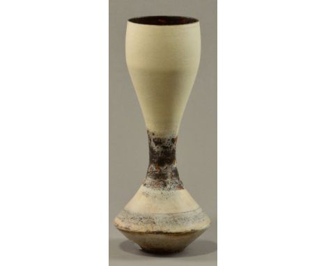 HANS COPER (1920-1981); a stoneware hourglass vase, white slip over textured manganese ground, blistered band to middle, impr