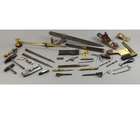A quantity of tools including a brass and rose wood square, two pocket knives, unnamed plane parts and a large pair of calipe