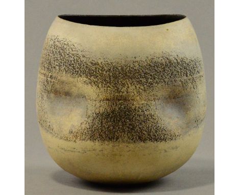 HANS COPER (1920-1981); a large stoneware flower holder, oval and pinched bulbous form, white slip over textured manganese gr