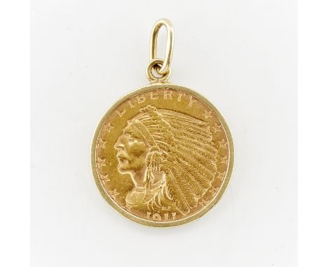 1911 $2.5 "Indian Head" gold coin set as a pendant. Depicting the bust of a Native American with a feathered headdress, this 