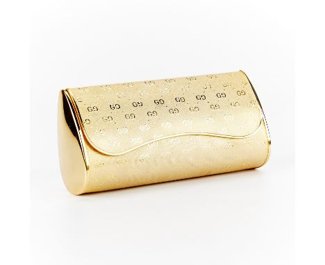 Vintage Gucci minaudiere clutch in gold-tone metal with classic logo, interior lined with brown velvet, front flap opens to a