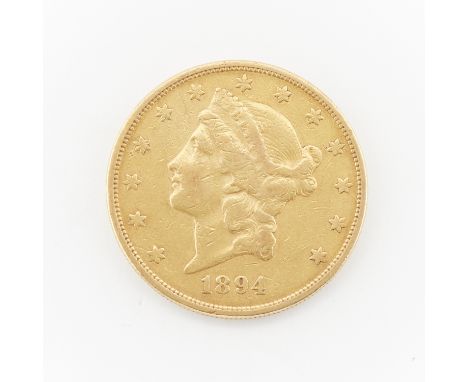 One 1894-S twenty dollar gold coin featuring on the obverse the bust of Lady Liberty encircled by 13 stars with the year belo