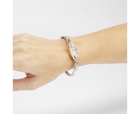 Ladies' Hamilton wristwatch, 14k white gold case set with 31 single cut and two full cut diamonds, dial with arrow and dot ho