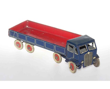 Vintage tin plate model of a truck with 'Dunlop Fort' tyres and wind-up mechanism, 43.5cm