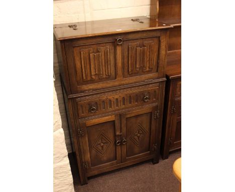 Oak linen fold panel cocktail cabinet